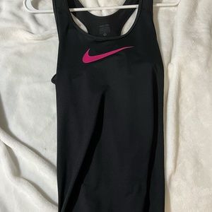 black nike tank with pink swoosh